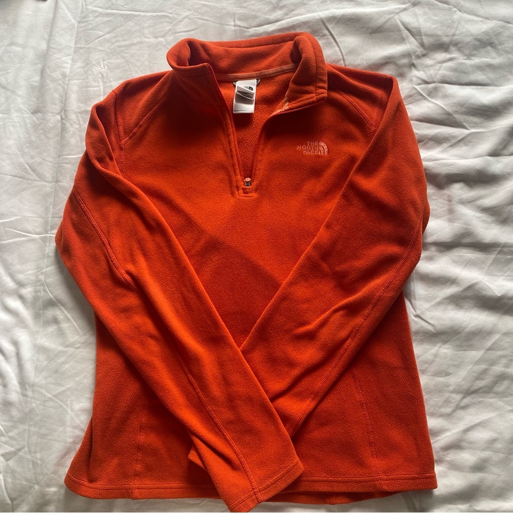 The North face Small quarter zip pull over. Soft and comfy, no rips no stains.